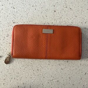 Cole Haan pebble leather wallet color orange